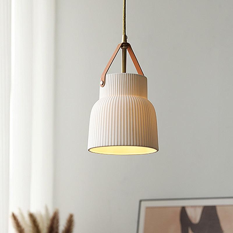 Gina Ridged Ceramic Pendant Light white ridged ceramic shade brown faux leather strap braided gold cord brass rod
