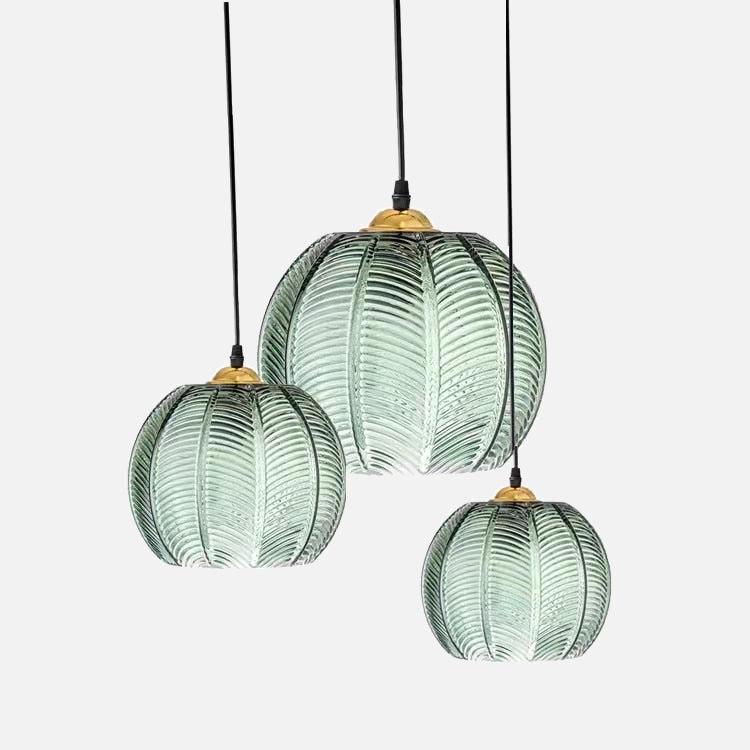 Leaf Pattern Pendant Light with tinted glass leaf motif plated iron and gold tone accents adjustable 1.5m cord sizes 15–22 cm