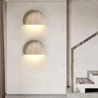 stone textured basin wall light sculptural wall sconce warm ambient lighting modern minimalist wall lamp