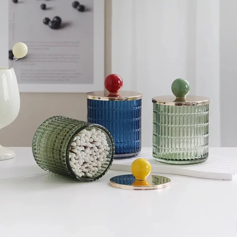 Textured glass canister with colorful knob and metal lid storage jar