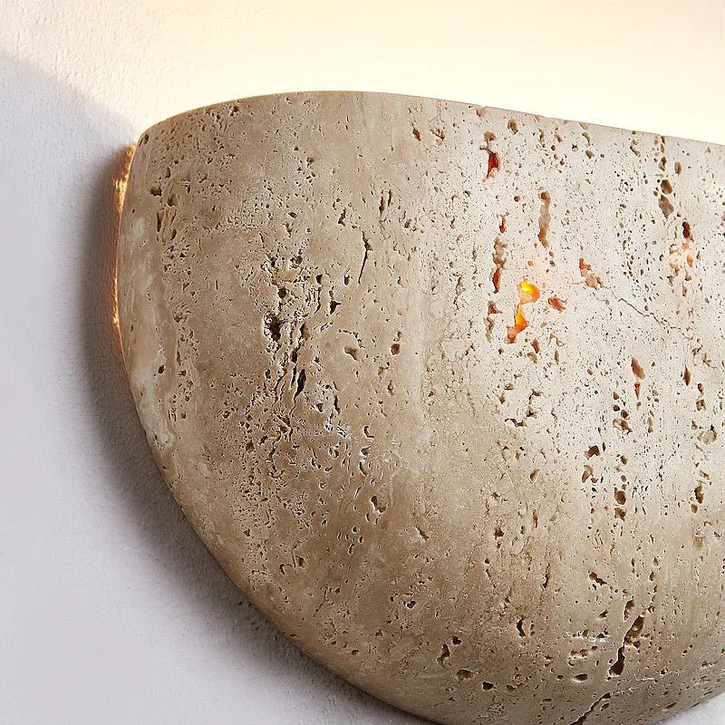 stone textured basin wall light sculptural wall sconce warm ambient lighting modern minimalist wall lamp