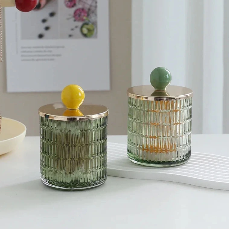 Textured glass canister with colorful knob and metal lid storage jar