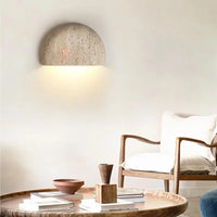stone textured basin wall light sculptural wall sconce warm ambient lighting modern minimalist wall lamp