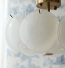 Pendant light cream-white glass discs brass accents Nordic design ceiling light pendant lamp