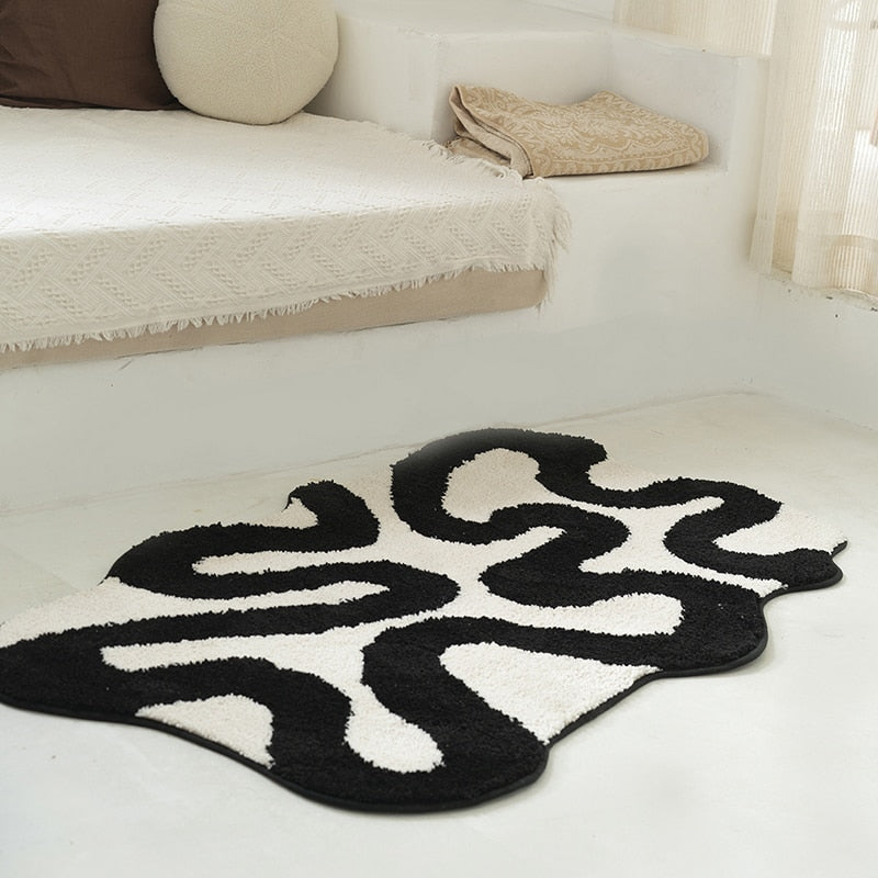 Black Swirl Shaped Area Rug