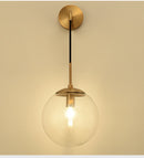 globe clear glass Antique Gold-tone Black metal hanging wall sconce