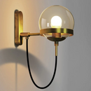 Stella Wall Sconce With Stand black metal ring holding tinted glass globe mounted on backplate 6in shade 30in cord