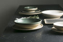 round ceramic green plate and bowl