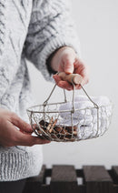 rectangle webbed wrought iron basket with wooden handle